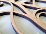 Close up of intricate laser cut shapes on a 6mm MDF