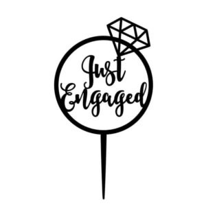just engaged cake topper with diamond ring made from black acrylic