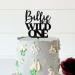 Name is a wildone cake topper in black acrylic - pastel grey cake