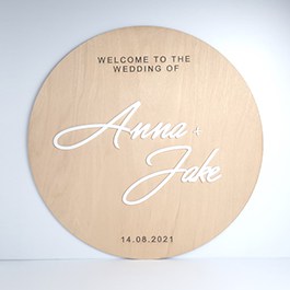 Round Plywood Wedding Welcome Sign featuring 3D White Acrylic Names and Engraved Text on a White Pain Background